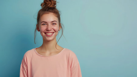 Pretty smiling joyfully female with fair hair, dressed casually, looking with satisfactionの素材