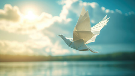 Peace concept. Conceptual photos to show the Freedom of White Origami Dove or Pigeon Flew from the Water into the Sky.の素材