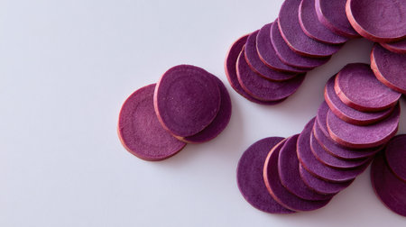 A stunning arrangement of vibrant purple circles on a clean white surface, perfect for creative designs, craft projects, or minimalistic backgrounds.の素材