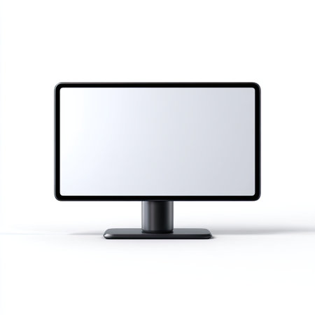 Sleek and modern computer monitor featuring a blank screen against a pure white background. Ideal for showcasing technology and workspace concepts.の素材