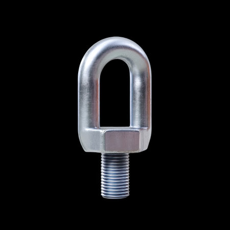 This close-up image features a metallic U-shaped eye bolt set against a black background, highlighting its industrial design and sturdy craftsmanship.の素材