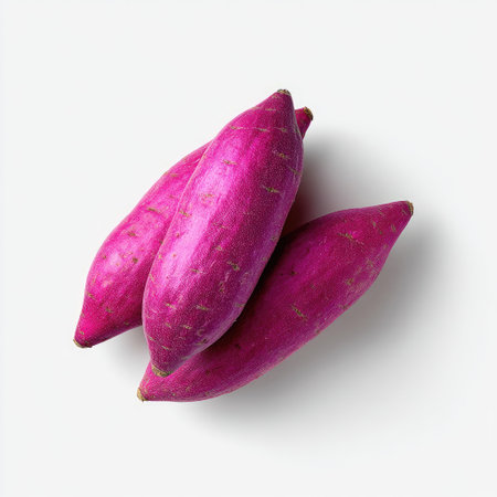 Vibrant purple sweet potatoes displayed against a clean white background, showcasing their natural beauty. Perfect for healthy recipes and gourmet dishes.の素材