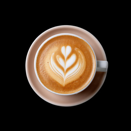 This captivating image features a beautifully crafted latte with intricate heart-shaped foam art. The coffee sits in a round cup against a striking black background, perfect for conveying warmth and comfort.の素材