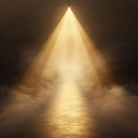 Golden spotlight beams forming a triangle through mistの素材