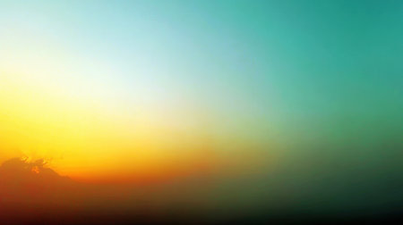This stunning image captures a beautiful gradient sunset transitioning from warm orange to soft turquoise, creating a serene atmosphere perfect for tranquil moments.の素材