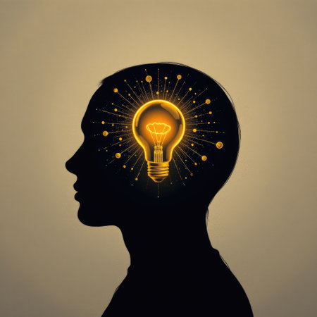 This artistic image depicts a human silhouette with a glowing light bulb symbolizing creativity and inspiration, reflecting the essence of innovative thought.の素材