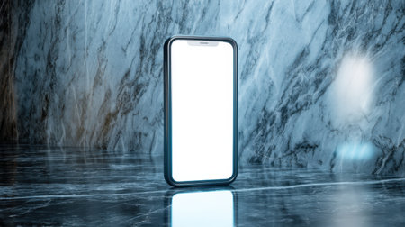 A sleek smartphone stands upright on a reflective marble surface, featuring a blank white screen. This modern device symbolizes innovation and style in a contemporary setting.の素材