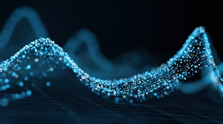 A mesmerizing visual of glowing blue particles forming fluid wave patterns against a dark backdrop, symbolizing innovation and the digital landscape of modern technology.の素材
