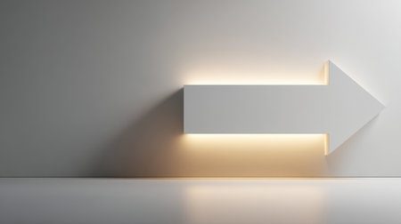 A sleek, illuminated white arrow sign on a minimalist wall showcases a modern design that emphasizes direction and guidance in a contemporary interior space.の素材