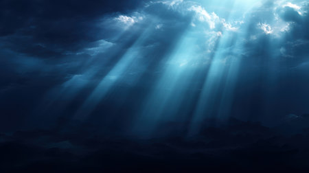 Mesmerizing light rays pierce through dark clouds, creating a stunning visual in an oceanic landscape. Ideal for themes of mystery, calm, and natural beauty.の素材