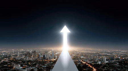 A stunning upward arrow illuminated against night sky, symbolizing growth and aspiration, with cityscape below. bright light creates sense of hope and directionの素材