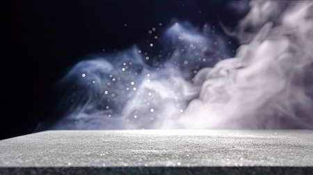 A close up view of textured concrete tabletop with soft, smoky background creating ethereal atmosphere. surface glistens subtly, enhancing overall aesthetic appealの素材