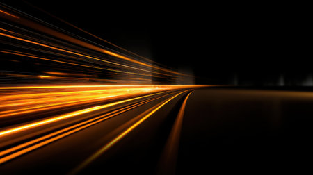 This abstract image features dynamic golden light trails that create a sense of motion and speed against a dark backdrop, perfect for modern design or tech themes.の素材