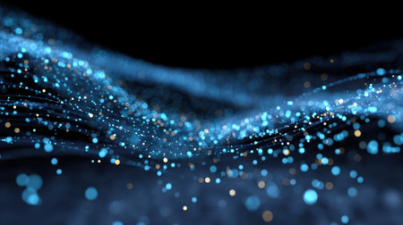This mesmerizing digital artwork features glowing blue particles flowing gracefully through a dark space, perfect for enhancing themes in technology and creativity.の素材