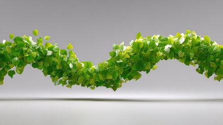 This image features a graceful wave of lush green leaves creating a vibrant decorative vine, perfect for nature-themed projects or interior design concepts.の素材