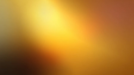 A beautiful abstract background featuring warm yellow and orange hues in a soft blurred gradient. Ideal for artistic and creative design projects needing a touch of warmth.の素材