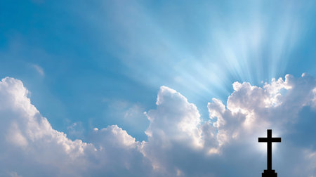 A closeup of cross silhouette against backdrop of clouds and sun rays, evoking sense of peace and spirituality. light shines beautifully, creating serene atmosphereの素材