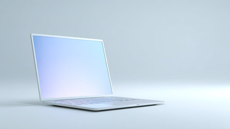 A sleek and modern laptop positioned on a minimalistic background creates a sophisticated and professional atmosphere. Ideal for technology-related projects.の素材