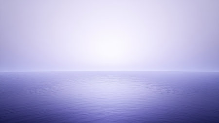 A serene ocean horizon captures the calmness of a morning scene with gentle waves and soft hues, evoking a sense of peace and tranquility.の素材