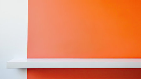 Vibrant orange wall with a sleek white shelf evokes a modern and minimalist feel, perfect for enhancing interior spaces in artistic and contemporary settings.の素材