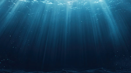 Explore the beauty of underwater tranquility as soft rays of sunlight penetrate the serene depths of the ocean, creating a mesmerizing and peaceful aquatic landscape.の素材
