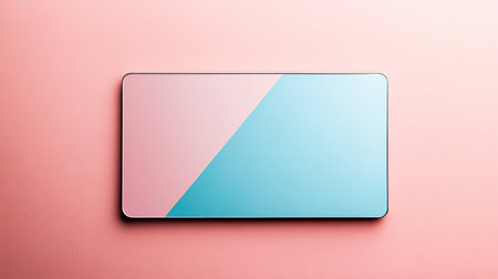 This image showcases a modern smartphone with a stylish split color design of pink and blue, perfect for highlighting contemporary technology in a minimalistic setting.の素材