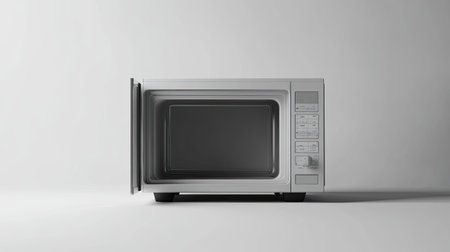 This image features a modern microwave appliance with an empty interior, showcasing a sleek design ideal for contemporary kitchens. Perfect for various culinary needs.の素材