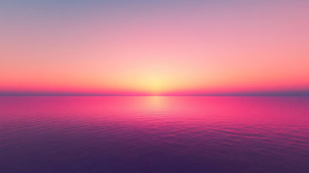 This image captures a serene sunset over calm water, showcasing vibrant pink and purple hues blending seamlessly into the horizon, creating a tranquil scene.の素材