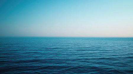 A serene ocean view featuring calm waters and a stunning blue sky. This image evokes feelings of peace and relaxation, perfect for travel and nature themes.の素材