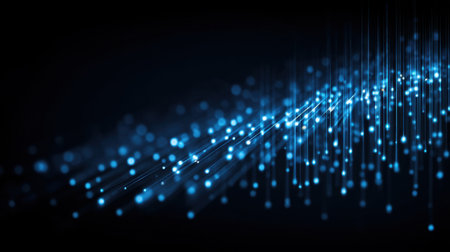 This vibrant digital artwork features dynamic blue particles on a dark background, creating a sense of movement and energy ideal for technology and science visuals.の素材