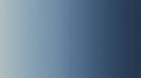 This blue gradient background features a smooth transition of colors, perfect for design projects, websites, and artistic endeavors, providing a calming visual effect.の素材