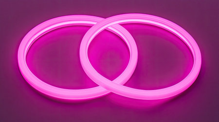 Two interlocking pink neon rings create a captivating visual on a soft gradient background, evoking a sense of elegance and modernity in design.の素材