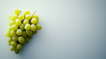 A stunning close-up of fresh green grapes, showcasing their natural beauty against a soft light background. Ideal for food-related themes.の素材