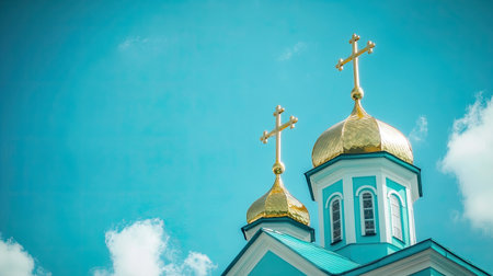 Beautiful church featuring golden domes and crosses under a vibrant blue sky. A stunning architectural piece representing cultural and spiritual significance.の素材