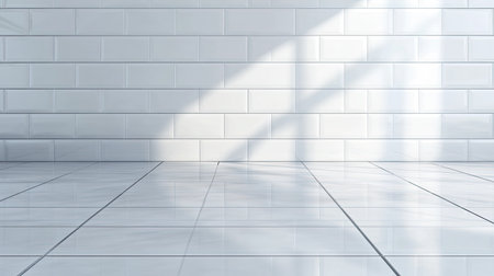A bright and clean white tile wall reflects soft shadows, creating a serene and modern atmosphere. This minimalistic space invites creativity and style.の素材