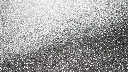 A stunning silver glitter background featuring vibrant sparkles and a smooth texture. Ideal for creative projects, invitations, and festive designs.の素材