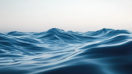 A serene view of gentle ocean waves glistening under soft morning light. The calming blue hues create a tranquil atmosphere, ideal for relaxation and nature appreciation.の素材