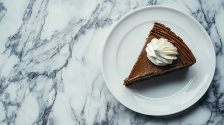 A beautifully presented slice of chocolate cake topped with whipped cream on a white plate, resting on a marble surface, perfect for dessert lovers.の素材