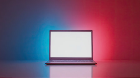 Modern laptop with blank screen on a clean table, space for text above and belowの素材