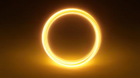 This captivating image features a glowing circular light ring that radiates warmth and vibrancy. The soft halo effect contrasts beautifully with the dark background, creating an inviting and mystical ambiance, perfect for artistic designs or background imagery.の素材