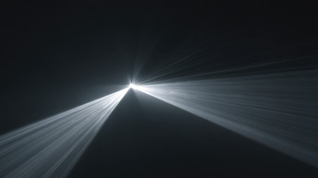 A mesmerizing display of light rays dispersing through deep darkness, creating a magical and surreal environment ideal for artistic and creative applications.の素材