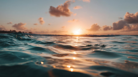 A tranquil scene showcasing gentle ocean waves as the sun sets on the horizon. Soft colors illuminate the water, creating a serene and peaceful atmosphere perfect for escape.の素材