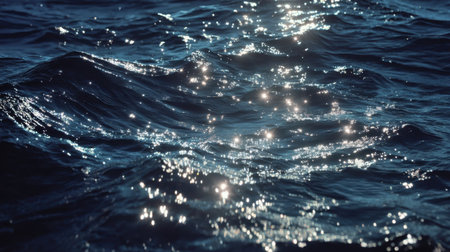 This stunning image captures shimmering ocean waves under radiant sunlight, creating a serene and tranquil atmosphere perfect for relaxation or meditation.の素材