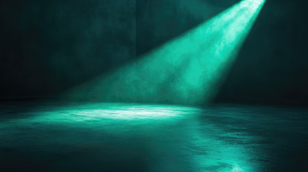 A glowing green spotlight shining on a smooth surface, with soft light fading at the edges, creating a calm ambiance. No text, no people.の素材