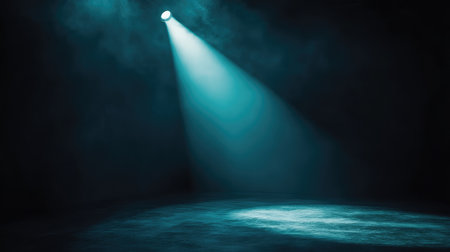 A single club spotlight focused on an empty dance floor, cutting through the darkness and fog with sharp rays of light that gradually soften towards the edges, casting long shadows around the room. No text, no people.の素材
