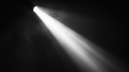A spotlight beam with a soft gradient, fading as it reaches the edges of the frame, creating a focused but smooth contrast. No text, no people.の素材