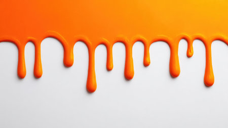 A captivating image of vibrant orange paint dripping down a white surface, perfect for creative projects, design themes, and artistic expressions highlighting bold colors.の素材