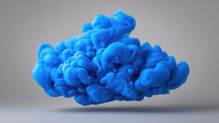 Abstract blue smoke or ink in water background with negative space, ideal for elegant product presentationsの素材