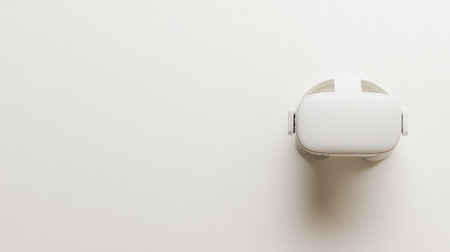 A virtual reality headset on a white background with a subtle glow, leaving enough space for text or brand elements.の素材