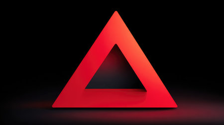 Modern abstract red triangle with shadows over black background, bold style and copy spaceの素材